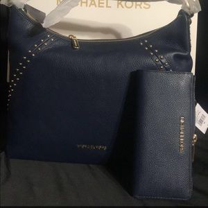 Navy blue Michael Kors purse and matching wallet